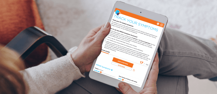 Image of a woman sitting on an exam table listening to a healthcare professional