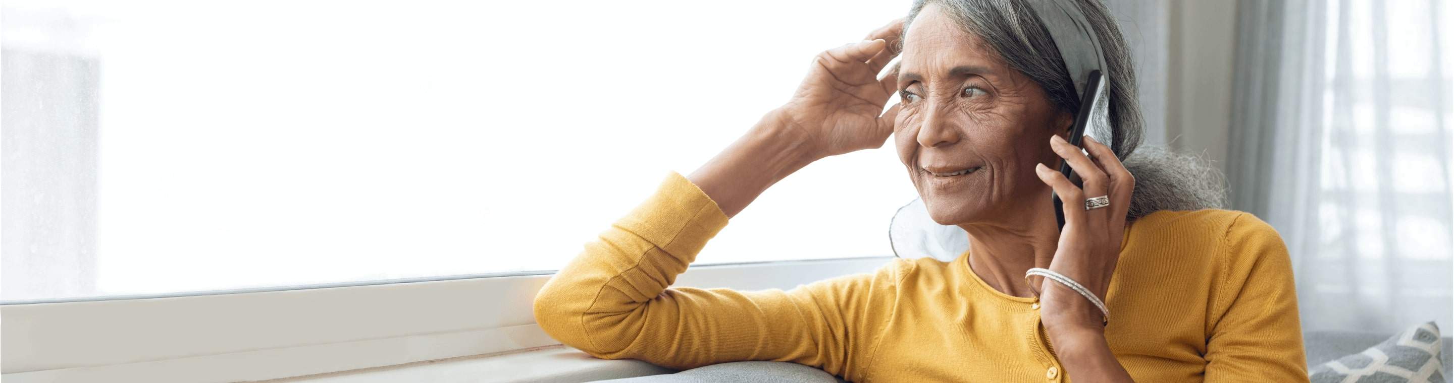 Image of a woman on a mobile phone