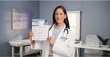Female doctor in a clinic showing an assessment form