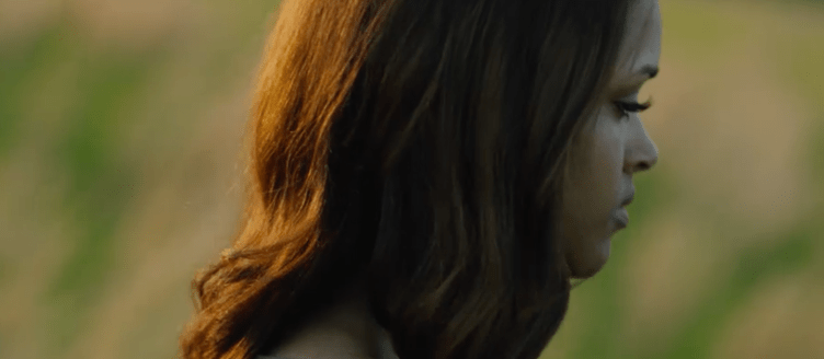 Image of a young woman outside