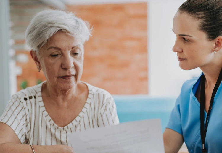 Image of patient smiling while talking to doctor